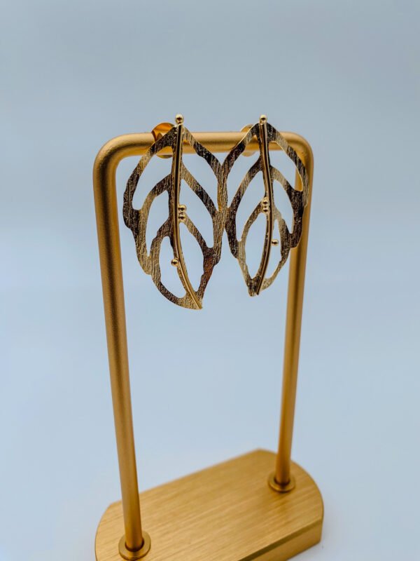 Arete Bronce Hoja Croquis Baño 24K