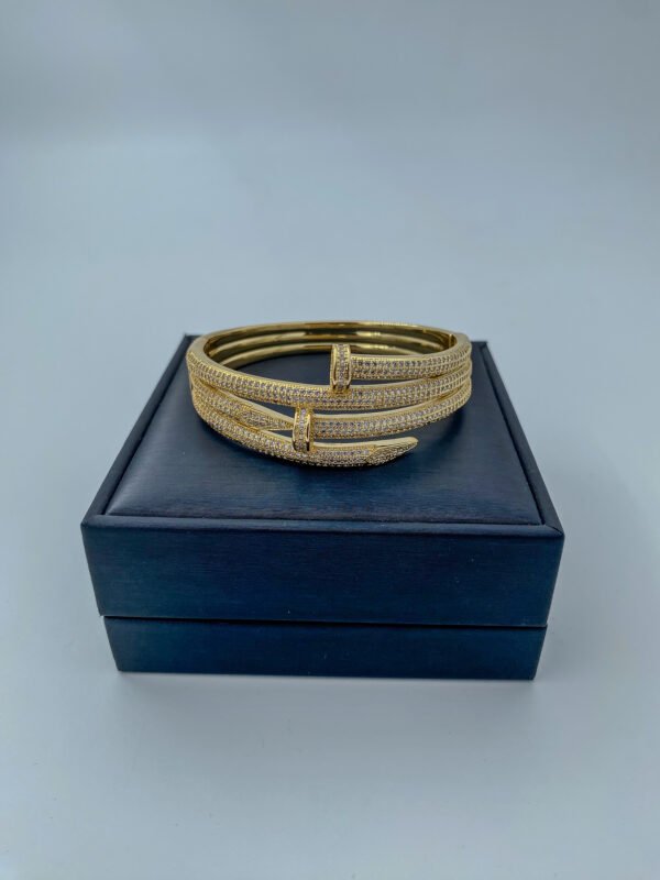 Brazalete Rodinado Tipo Clavo Doble Cartier
